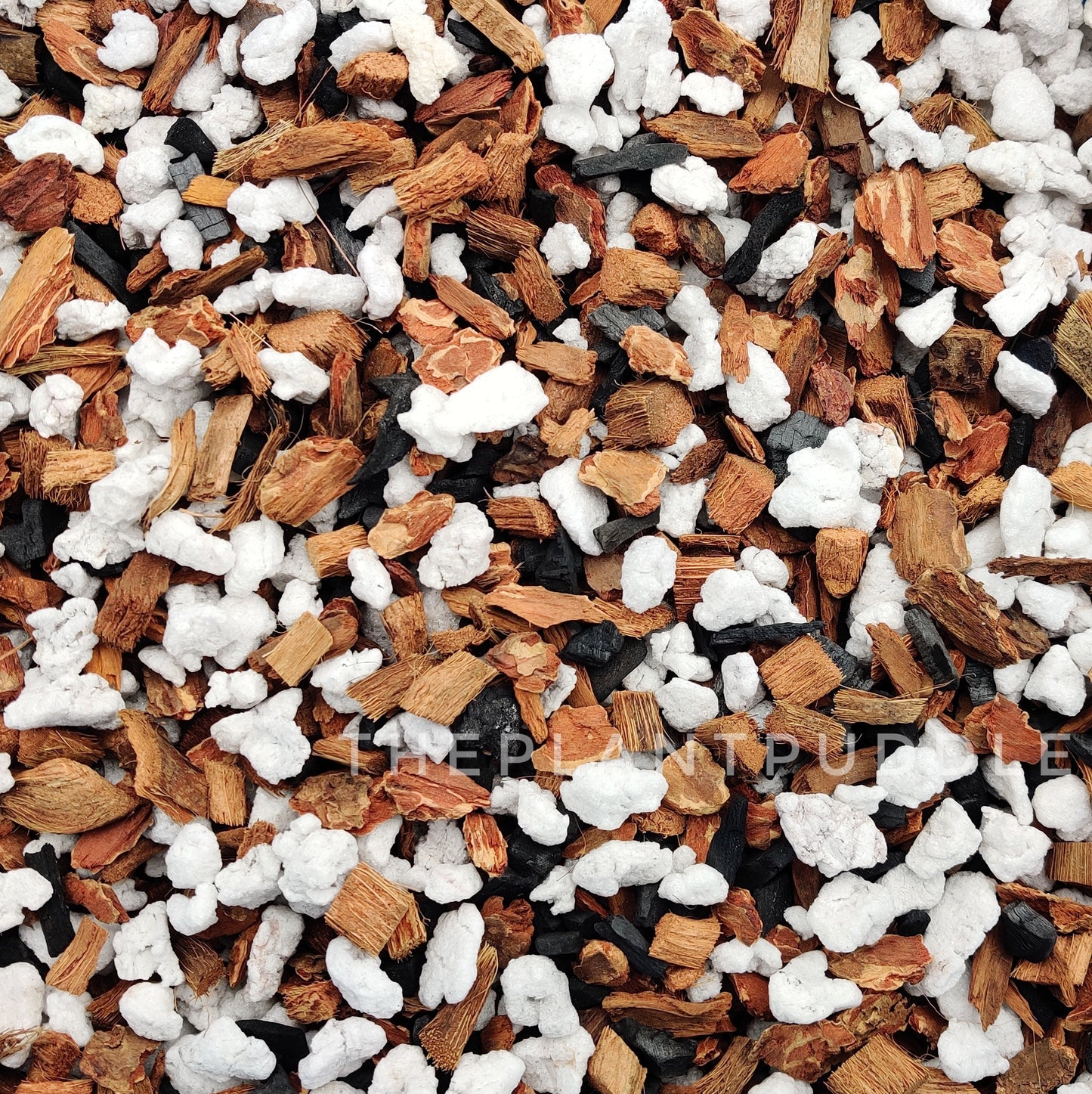 chunky version of "just the chunks" containing large perlite, coconut husk chips, orchid bark, and horticultural charcoal