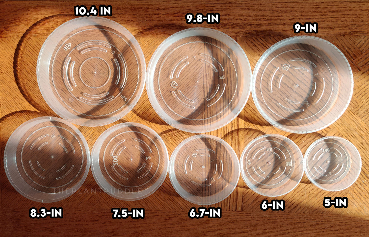 8 sizes of clear plant pot saucers