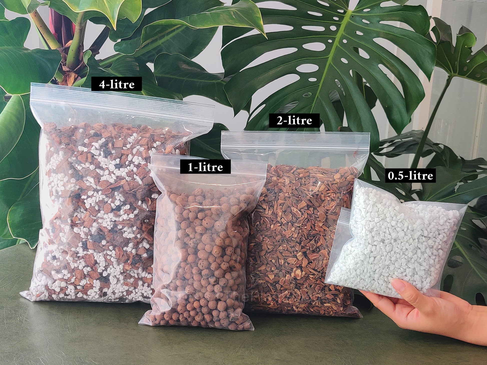 4 bags of plant substrates showing available package sizes