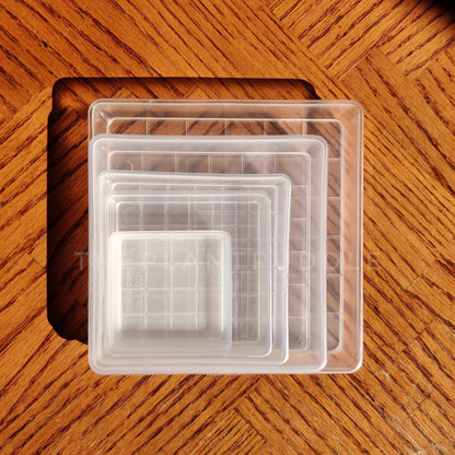 square plant pot saucers stacked