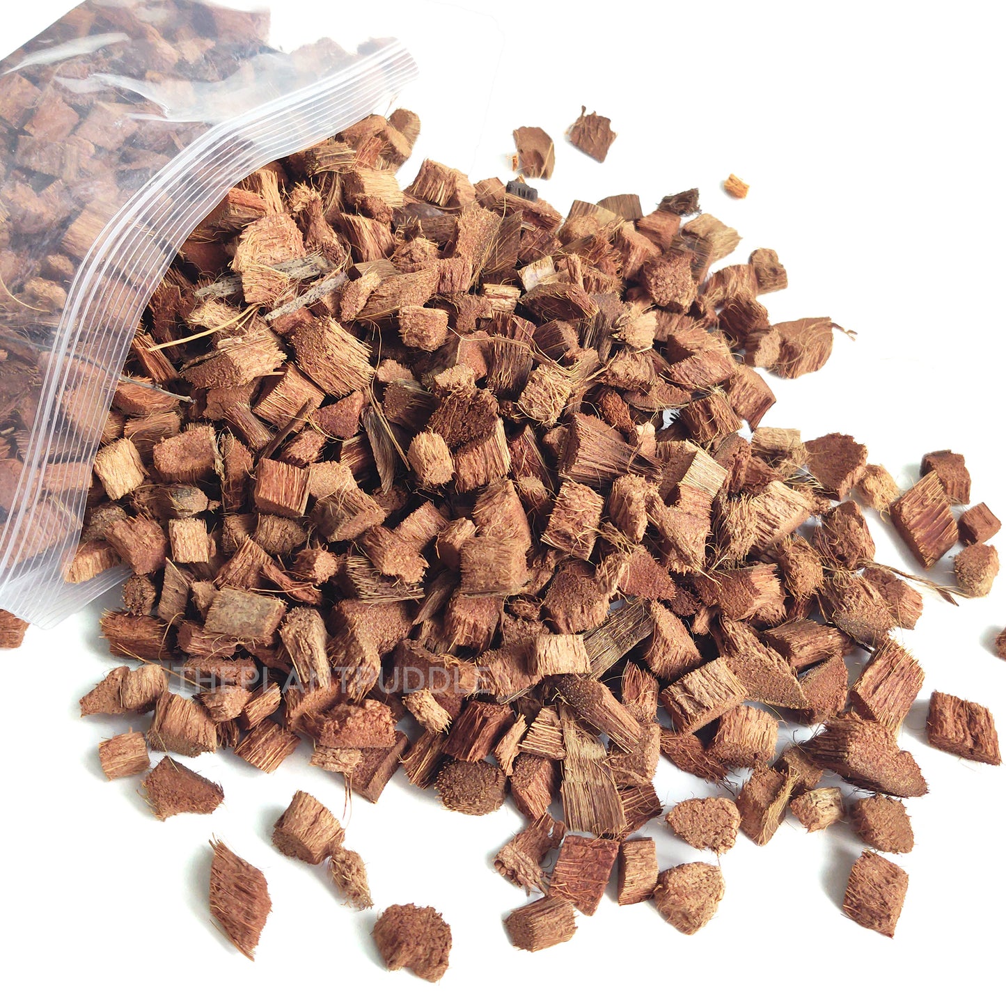 coconut husk chips spilling from bag