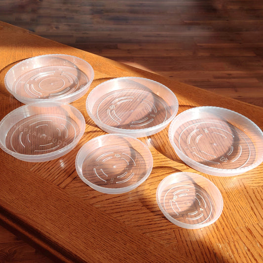 6 sizes of clear plastic plant pot saucers