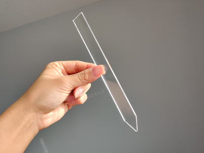 transparent plant label held in hand